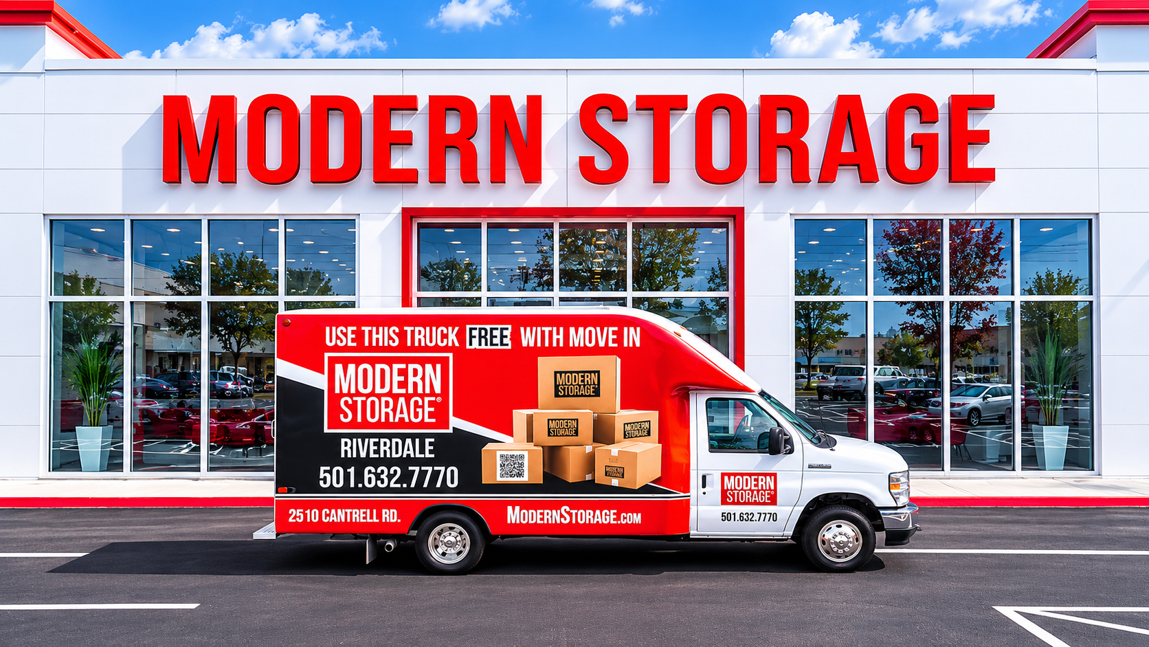 Modern Storage® Riverdale Moving Truck Modern Storage® moving truck parked in front of the Riverdale facility entrance with branded graphics and storage boxes displayed on the truck wrap.